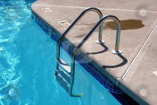 cutcaster-photo-100627103-Swimming-pool-Ladder.jpg