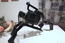 full AF100 rigged with handgrips and shoulder pad.jpg