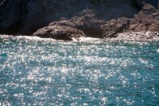 2574536-azure-sea-water-surface-with-ripple-and-sun-reflection-sparkles.jpg 2574536-azure-sea-water-surface-with-ripple-and-sun-reflection-sparkles.jpg