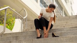 Business Woman Walking On High Heels Feeling Pain At Feet.jpg Business Woman Walking On High Heels Feeling Pain At Feet.jpg